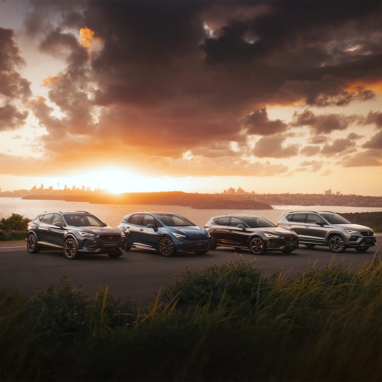 CUPRA car range in sunset.